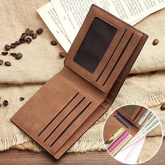 Brown wallet with card slots on a textured fabric background with coffee beans.