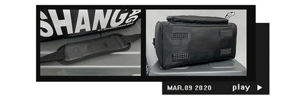 A black rectangular bag or case with a top handle and vent-like side details, shown in two inset views on a dark background. One view shows the item laid flat against a gray surface with a black strap attached, and the other shows the bag upright on a gray platform.
