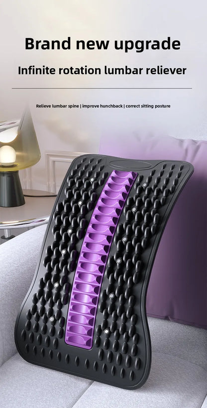 Infinite rotation lumbar reliever with purple center on a couch