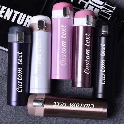 Set of personalized lighters with 'Custom text' engraved on them, displayed against a dark background.