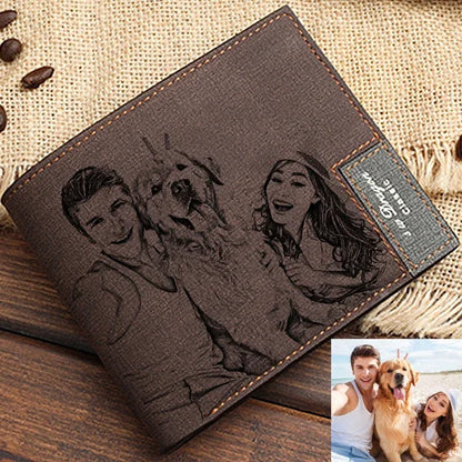 Brown leather wallet with engraved portraits of a couple and their dog, placed on a textured surface.