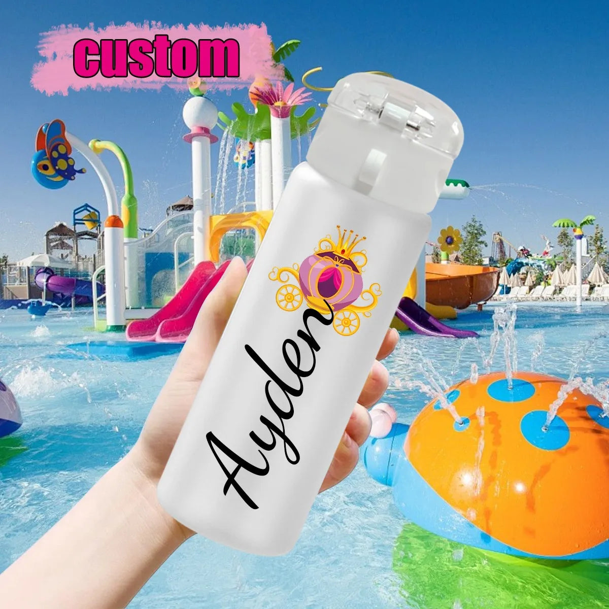 White water bottle with 'Ayden' printed on it held in front of a water park.